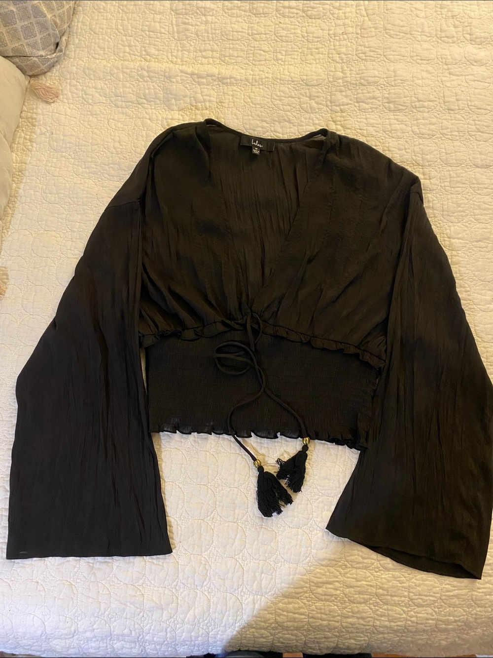 Lulu's Black Long-Sleeve Tie-Front Crop Top with Tassels